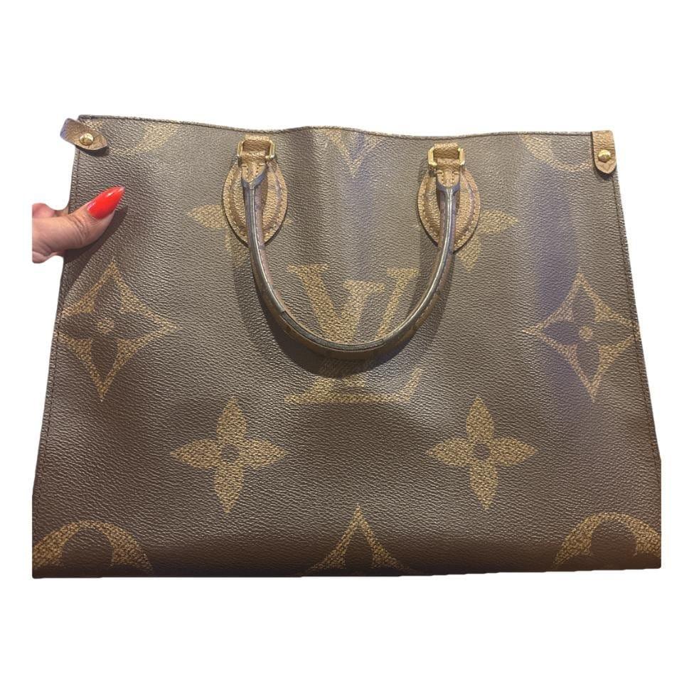 Onthego leather tote by LOUIS VUITTON