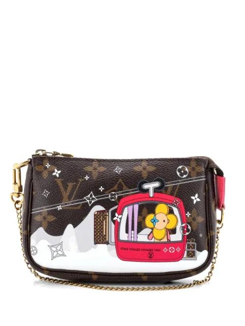 Pochette Accessoires Limited Edition Vivienne Xmas Monogram Canvas Mini clutch bag by LOUIS VUITTON 