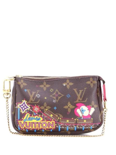 Pochette Accessoires Limited Edition Vivienne Xmas Monogram Canvas Mini clutch bag by LOUIS VUITTON 