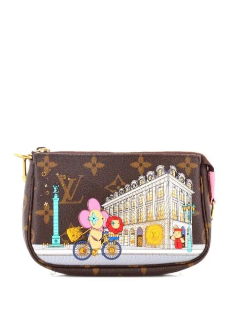 Pochette Accessoires Limited Edition Vivienne Xmas Monogram Canvas Mini clutch bag by LOUIS VUITTON 