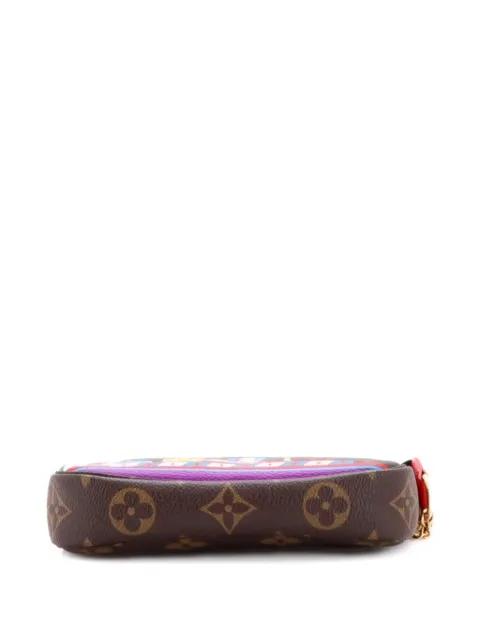 Pochette Accessoires Limited Edition Vivienne Xmas Monogram Canvas Mini clutch bag by LOUIS VUITTON 