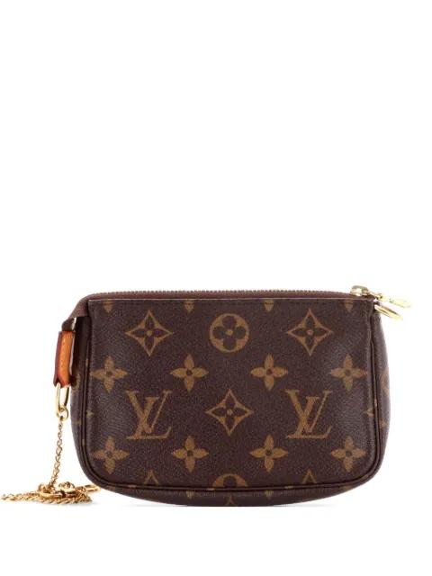 Pochette Accessoires Monogram Canvas Mini clutch bag by LOUIS VUITTON 
