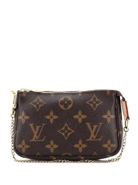 Pochette Accessoires Monogram Canvas Mini clutch bag by LOUIS VUITTON 