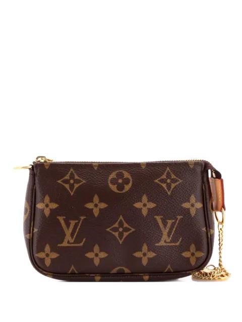Pochette Accessoires Monogram Canvas Mini clutch bag by LOUIS VUITTON 