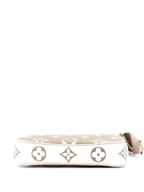 Pochette Accessoires Spring in the City Monogram Empreinte Leather Mini clutch bag by LOUIS VUITTON 