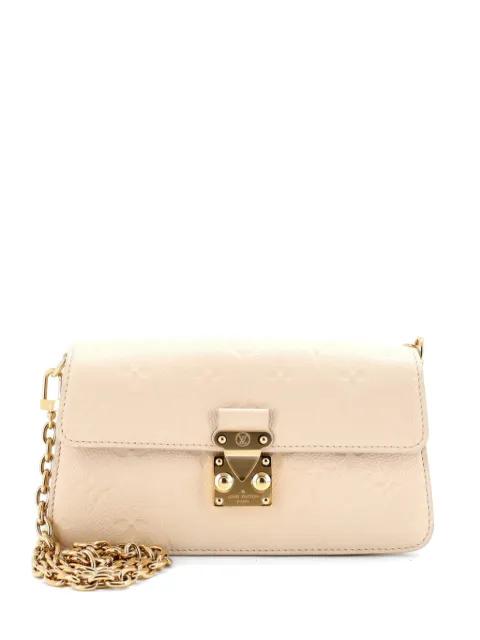 Pochette Metis Wallet on Chain Monogram Empreinte Leather crossbody bag by LOUIS VUITTON 