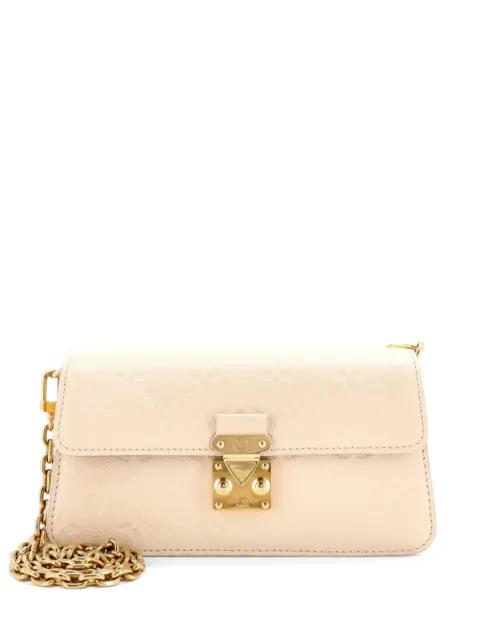 Pochette Metis Wallet on Chain Monogram Empreinte Leather crossbody bag by LOUIS VUITTON 