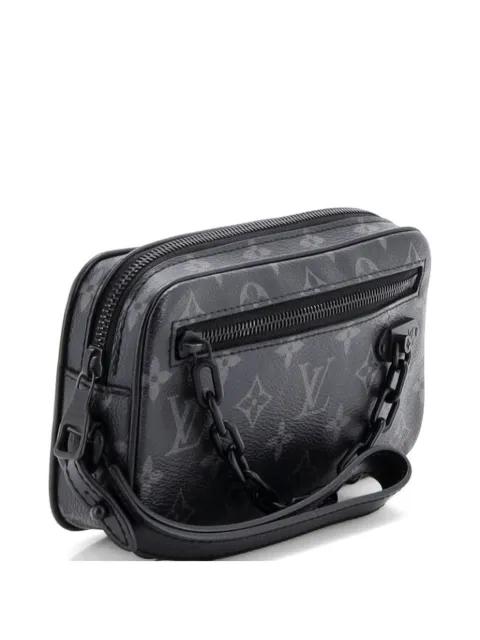 Pochette Volga Monogram Eclipse Canvas clutch bag by LOUIS VUITTON 