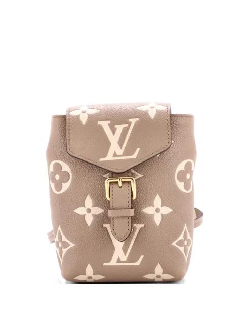 Tiny Bicolor Monogram Empreinte Giant backpack by LOUIS VUITTON 