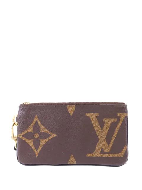 Trio Reverse Monogram Giant clutch bag by LOUIS VUITTON 