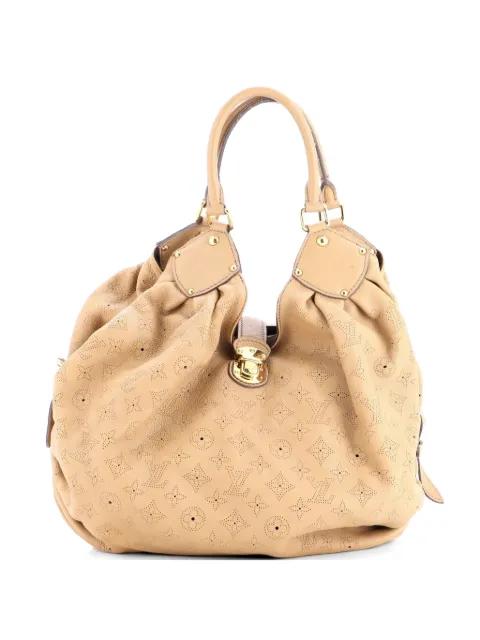 XL Mahina Leather hobo bag by LOUIS VUITTON 