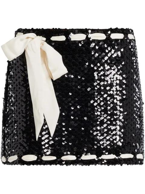 bow-embellished mini skirt by LOVESHACKFANCY