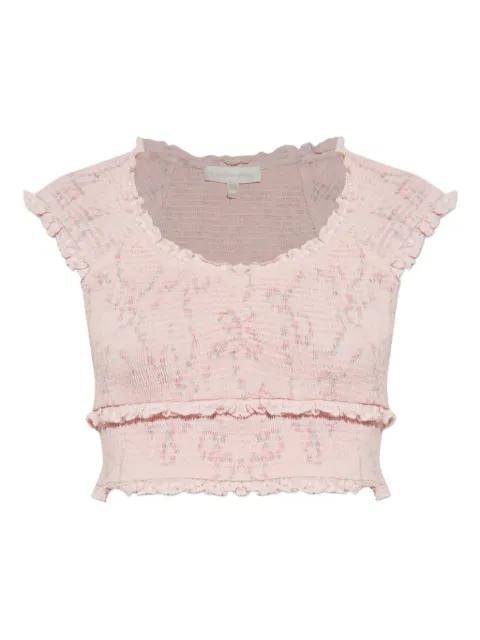 ruffled floral top by LOVESHACKFANCY