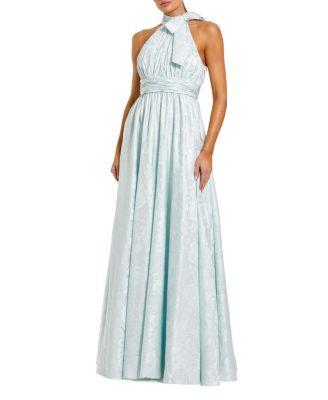 Sleeveless Halter Neck Brocade Gown With Bow Detail by MAC DUGGAL