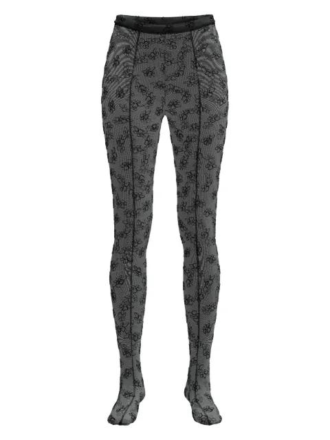 The Footed monogram leggings by MACCAPANI