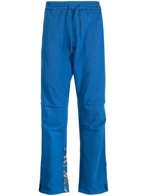 dragon-print cotton trousers by MAHARISHI