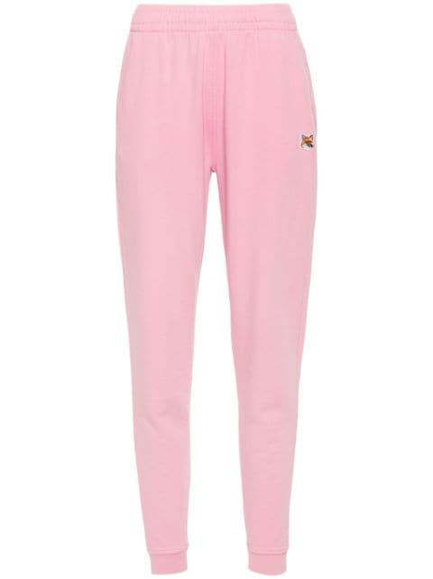Fox Head-appliqué track pants by MAISON KITSUNE