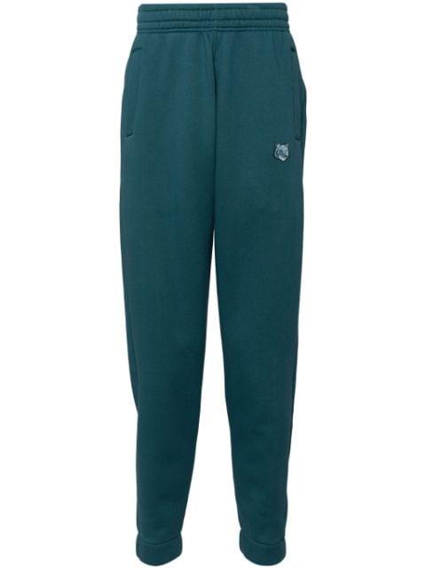 bold fox head patch comfort jog pants by MAISON KITSUNE