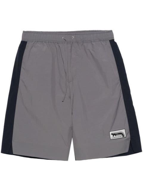 colour-block track shorts by MAISON KITSUNE
