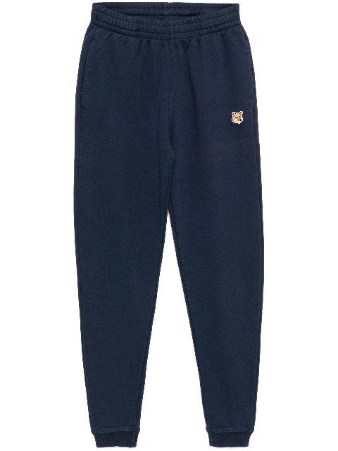 fox-head-patched track pants by MAISON KITSUNE