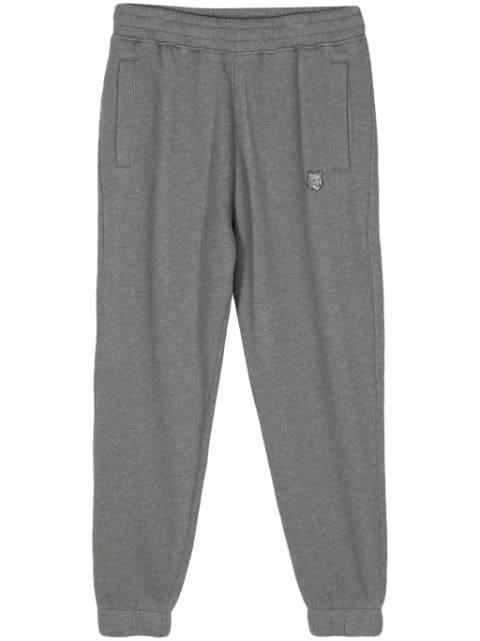 logo-appliqué track pants by MAISON KITSUNE
