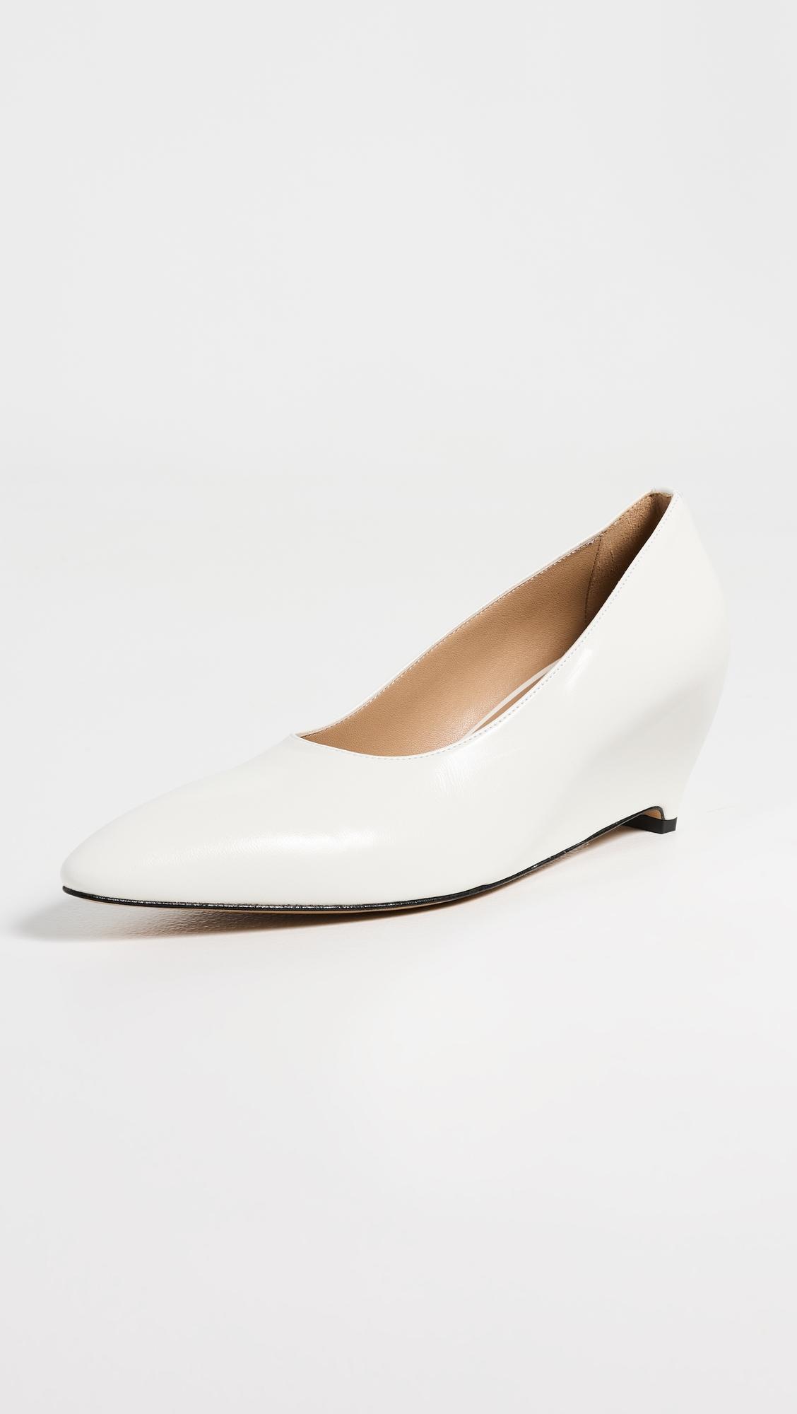 Heel-Less Pumps by MAISON MARGIELA