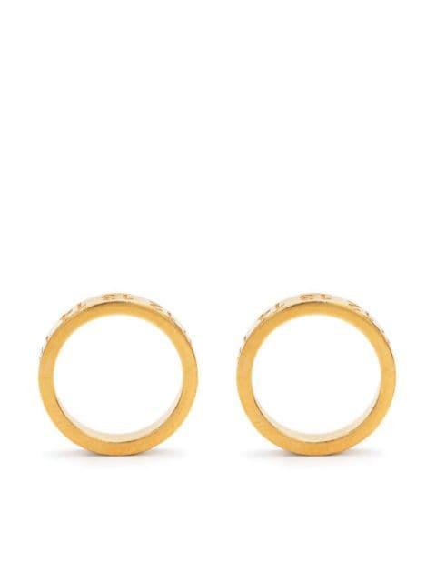Numerical engraved hoop earrings by MAISON MARGIELA