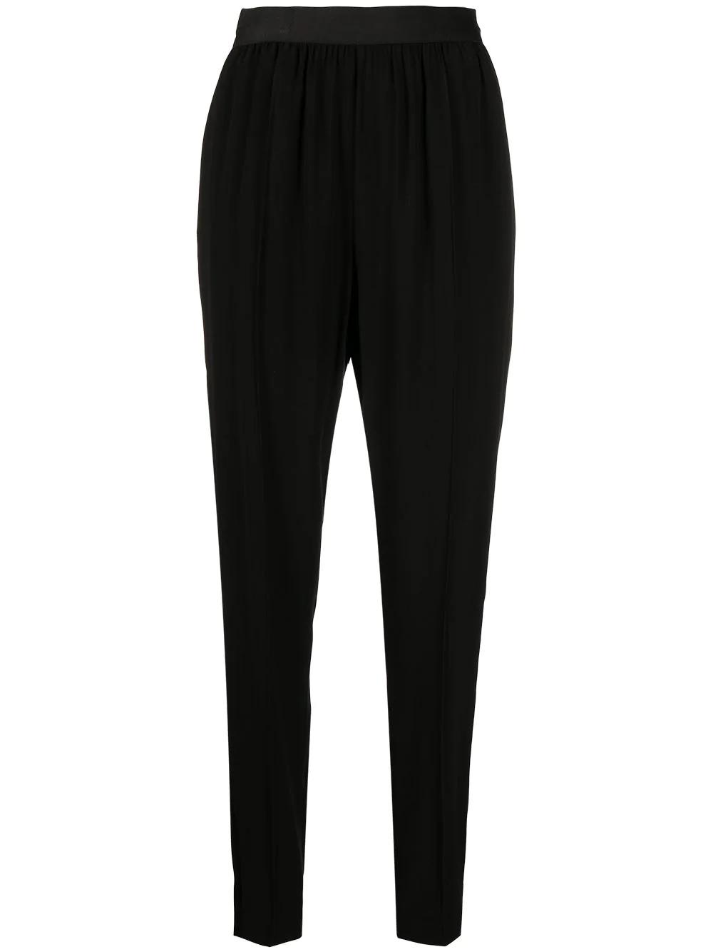 elasticated waistband tapered trousers by MAISON MARGIELA