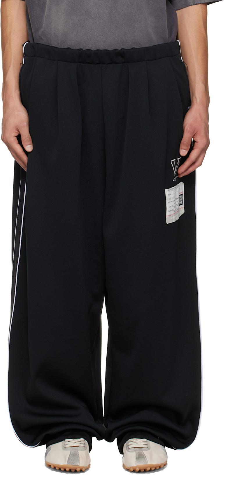 Black Amateur Sewn Like Track Pants by MAISON MIHARA YASUHIRO