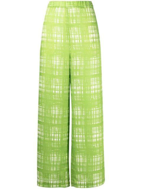 Random check pattern trousers by MAISON MIHARA YASUHIRO