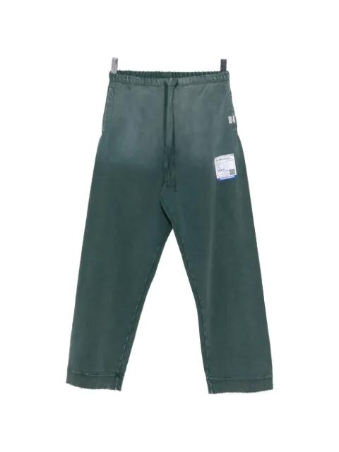 Sun Faded Like track pants by MAISON MIHARA YASUHIRO