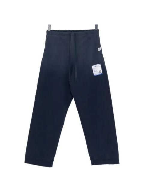 Sun Faded Like track pants by MAISON MIHARA YASUHIRO