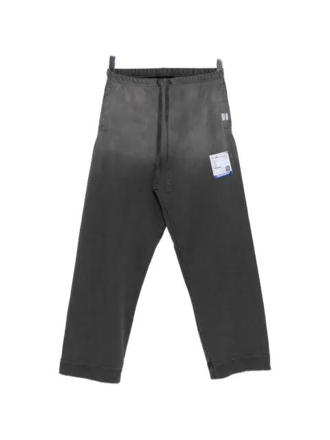 Sun Faded Like track pants by MAISON MIHARA YASUHIRO