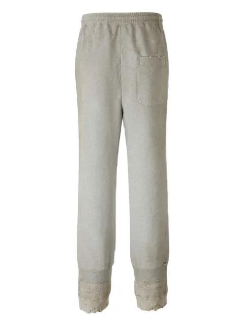 distressed hem trousers by MAISON MIHARA YASUHIRO