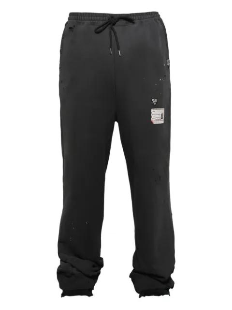 distressed track pants by MAISON MIHARA YASUHIRO