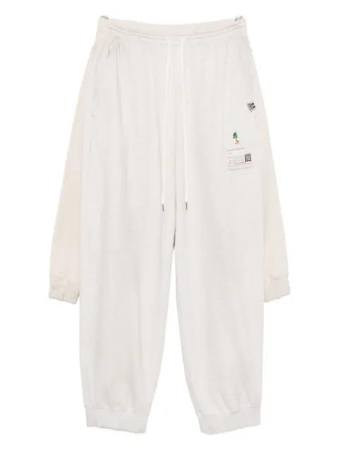 layered cotton track pants by MAISON MIHARA YASUHIRO