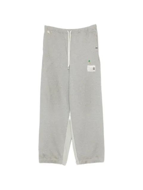 layered-hem track pants by MAISON MIHARA YASUHIRO
