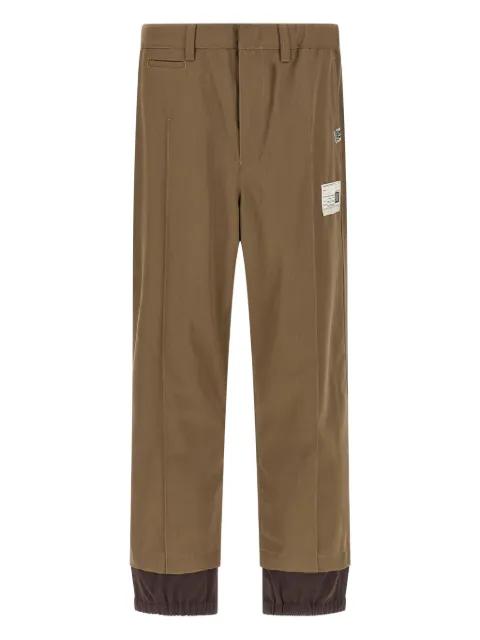 layered wool gabardine trousers by MAISON MIHARA YASUHIRO