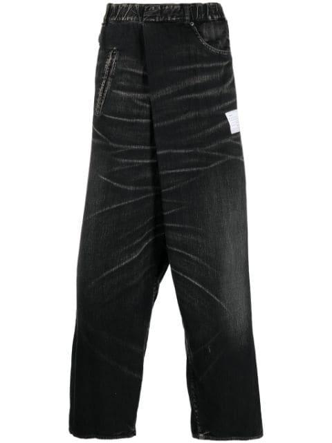 off-centre whiskered wide-leg jeans by MAISON MIHARA YASUHIRO