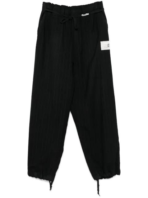pinstripe trousers by MAISON MIHARA YASUHIRO