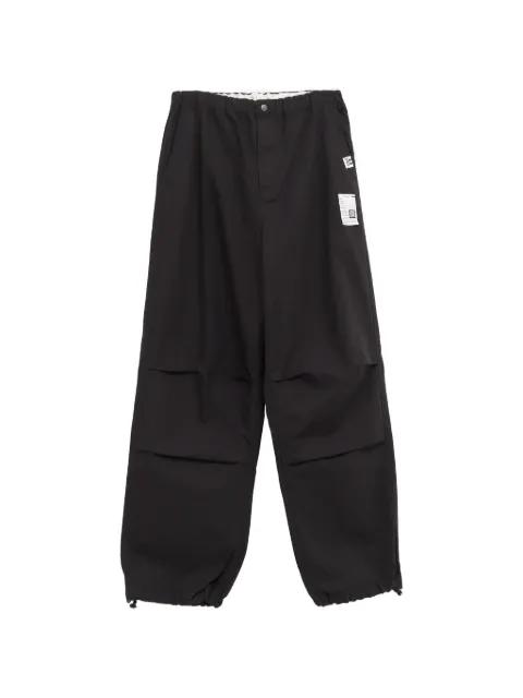 ripstop parachute trousers by MAISON MIHARA YASUHIRO
