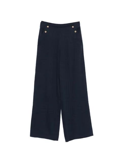 button-embellishment trousers by MAJE