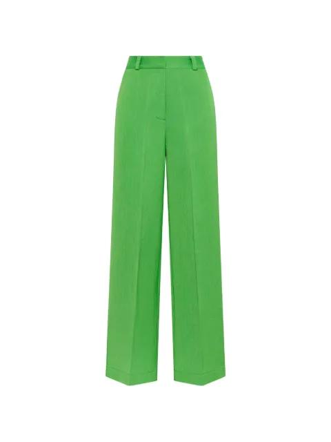 elasticated timeless linen trousers by MALIPARMI