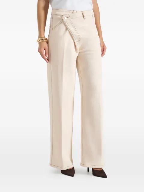 Astrid in cream wrapover wide-leg jeans by MANIERE DE VOIR