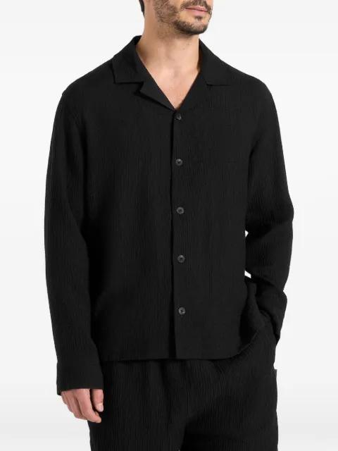 Bailey in black textured long-sleeve shirt by MANIERE DE VOIR