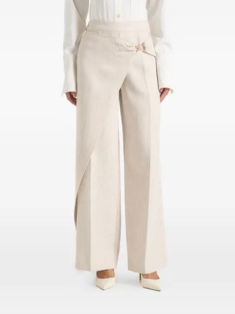 Beryl in green wrap tailored trousers with hardware detail by MANIERE DE VOIR