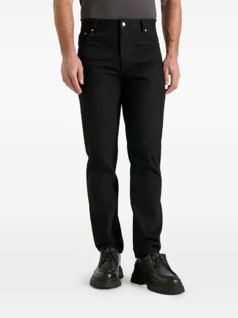 DN001 in black tapered fit denim jeans by MANIERE DE VOIR