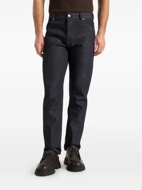 DN001 in indigo tapered-fit denim jeans by MANIERE DE VOIR