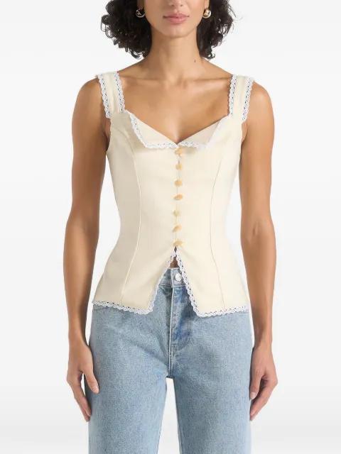 Delia in pale yellow lace-trim corset cami top by MANIERE DE VOIR