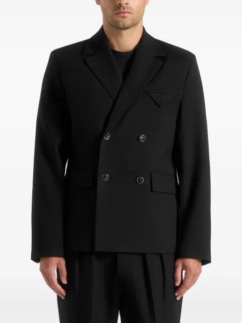 Didier in black double-breasted tailored suit jacket by MANIERE DE VOIR